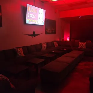 Both areas lined with couches