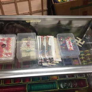 a display case with a variety of desserts