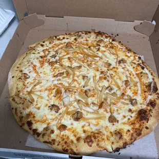 Layali pizza; chicken tossed with Buffalo and ranch topped with French fries