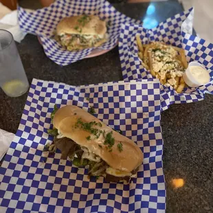 Fries w/ French Fries Topped with Feta Cheese Philly Cheese Steak Falafel Sandwich