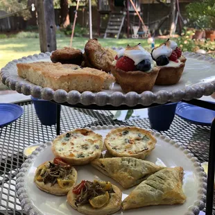 High tea: spinach + feta turnovers, mushroom galette, quiche Florentine, almond cake, fruit tart, kouign amann