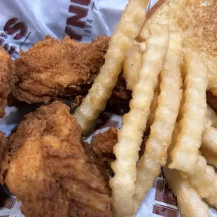 Spicy tenders, fries, bread