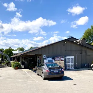 a car parked in front of the store