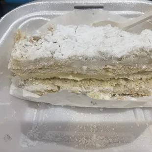 Amazing balance of chewy flaky texture and the custard inside is tart. delicious!!