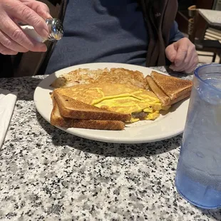 Mediterranean omelet, hash browns and toast