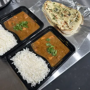 Chicken tikka masala with some garlic naan