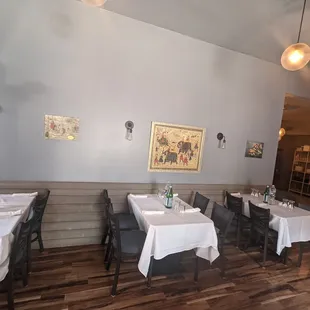 tables with white tablecloths