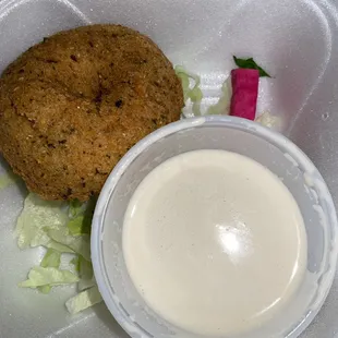 Tahini sauce and falafel ball