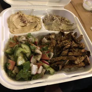 Chicken shawarma plate with fatouch salad and hummus and baba ghanouj
