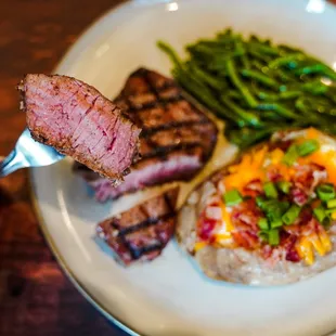 Certified Angus Beef grilled to order over a live hickory fire.