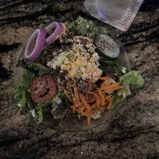 house salad with the Cinnamon Balsamic dressing.   Pork ribeye with roasted red pepper sauce with goat cheese.