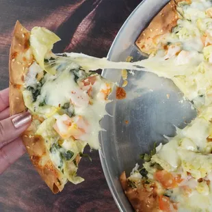 Nice, cheesy and crispy Lahvosh made just for you. Big enough to share with the whole table.