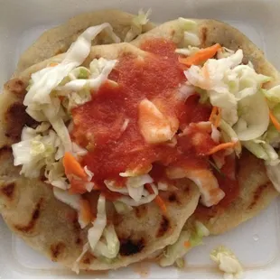 a taco with coleslaw