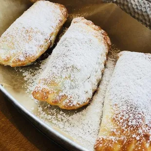 three pastries in a pan