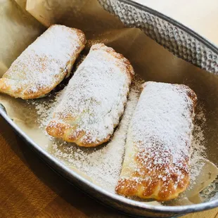 three pastries in a pan
