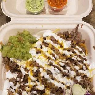 Carne Asada Fries.  Delicious! Green salsa is soo good too.