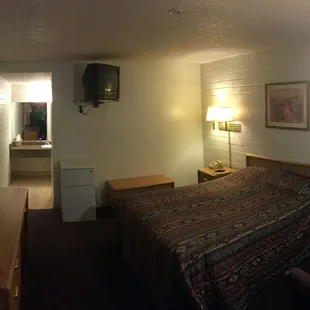 utilitarian room features, decent bed, mini fridge and a TV from the last century, but it all worked just fine!