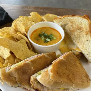a sandwich and chips on a plate