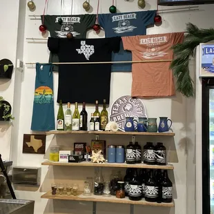 a variety of t - shirts on display