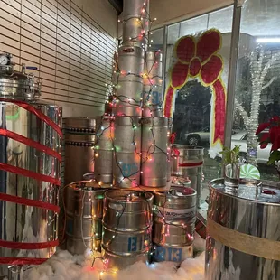 a christmas tree made out of beer kegs
