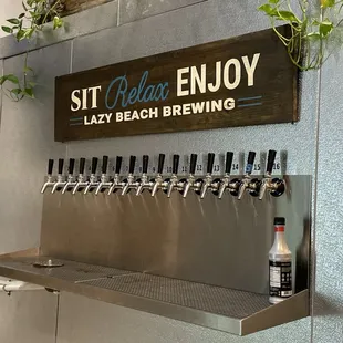 a row of beer taps