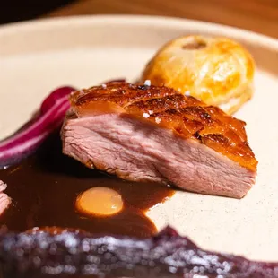 Roasted Dry Aged Duck, Apple Cider,
 Foie Gras Pithivier, Fermented Apple Mostarda