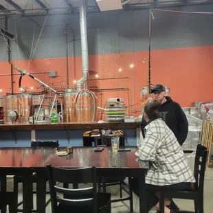 a man and a woman sitting at a table