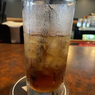 a cold drink with a straw