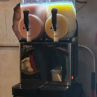 Now serving Cherry Limeade and Peach Bellini Slushies!