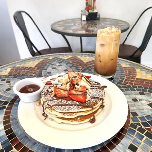 Pancakes banano strawberries and nutella Iced toasted  marshmallow latte