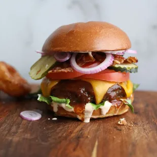 a hamburger and onion rings