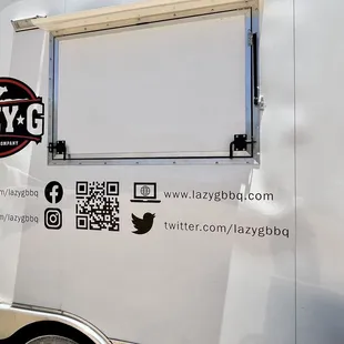 a food truck parked on the side of the road