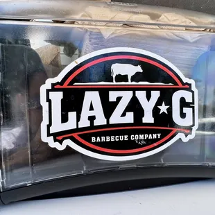 the logo of a barbecue company