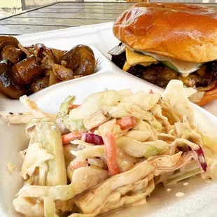 a hamburger and coleslaw