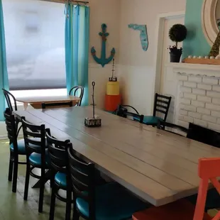 a dining room table and chairs