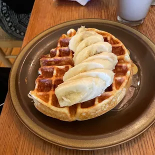 a waffle with banana slices on it