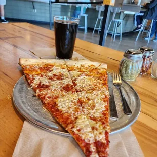 Cheese slice and an Ellipsis Zoning brew