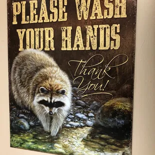 Another men's room sign.