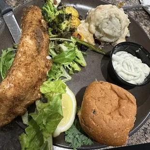 Walleye, breaded; mashed garlic potatoes with gravy, veggies &amp; cranberry muffin