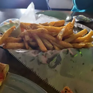 A boat load of tasty fries.