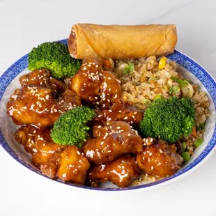 a plate of food with broccoli and rice