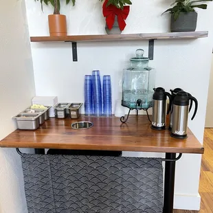 Complimentary water, cream and sugar at Lazybird Coffee in Alameda.