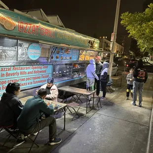 people eating outside