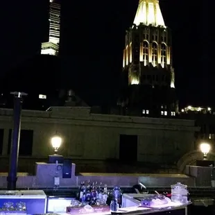 Bar with 10 light st in background