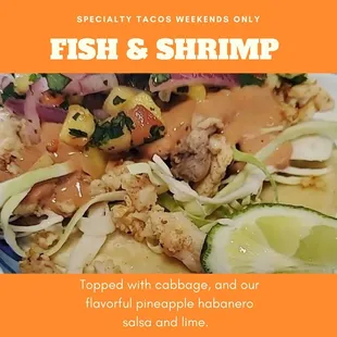 fish and shrimp served with cabbage and our flavorful pineapple honna salsa and lime