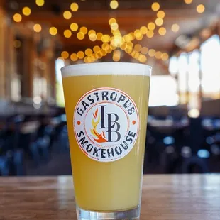 a glass of beer on a table