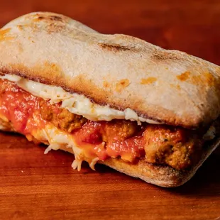 Polpette Parmigiana House mad meatballs, San Marzano tomato sauce, mozzarella.