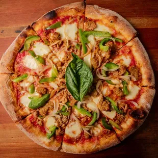 San Gennaro Pizza
Mozzarella, tomato sauce, sauteed pepper and onions, italian sausage.