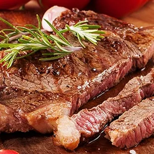 a steak on a cutting board