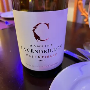 a bottle of wine on a table